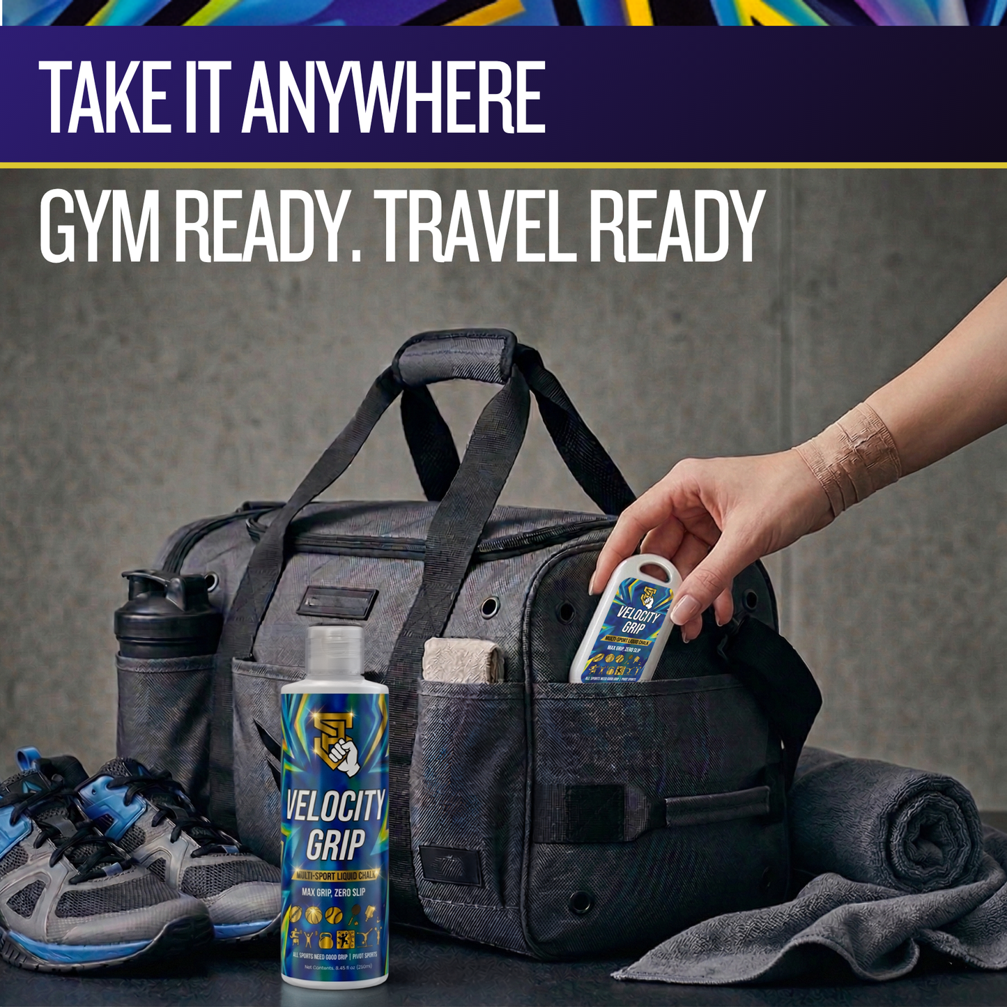 Black duffel bag with gym items and velocity grip products on a gray background
