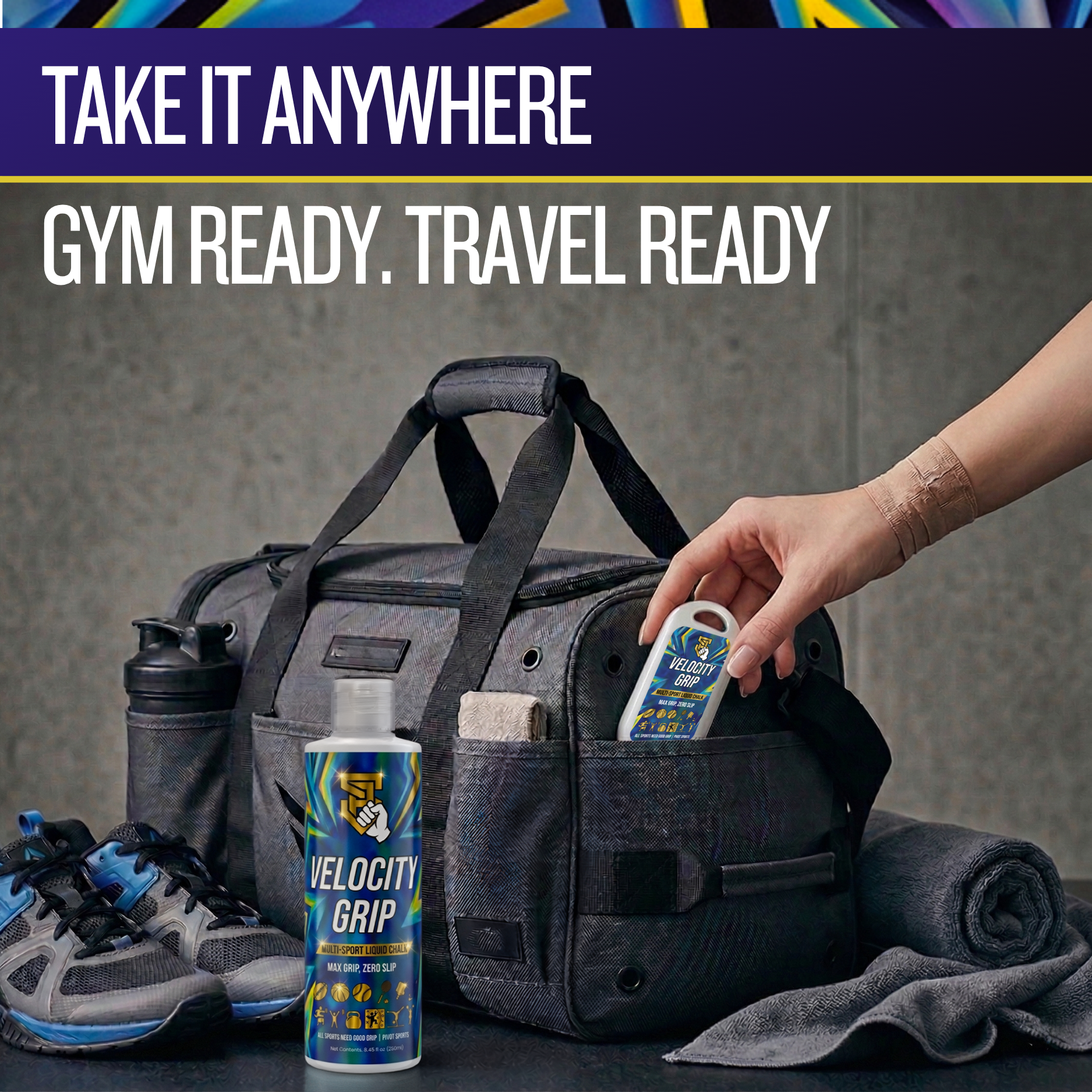 Black duffel bag with gym items and velocity grip products on a gray background